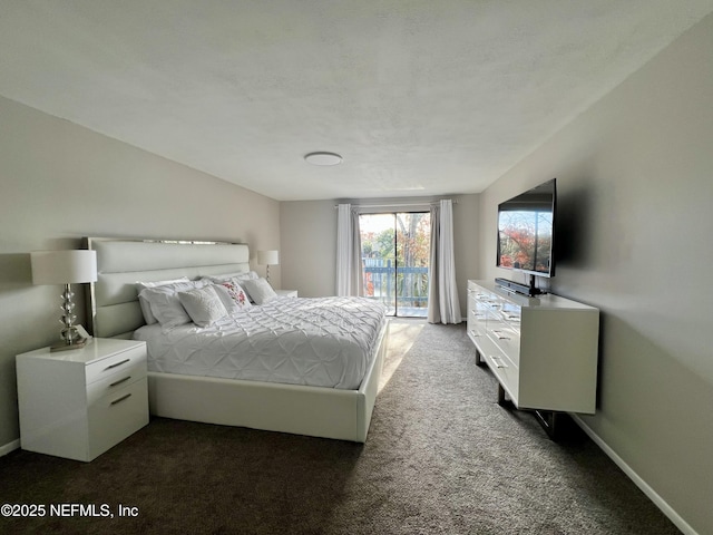 carpeted bedroom featuring access to outside