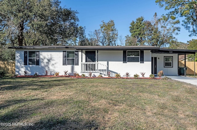 single story home featuring a front yard and a carport