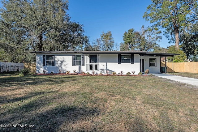 single story home with a carport and a front lawn