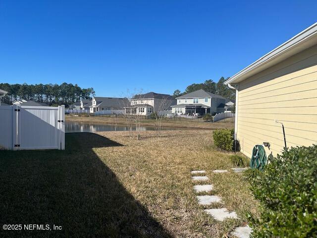 view of yard with a water view