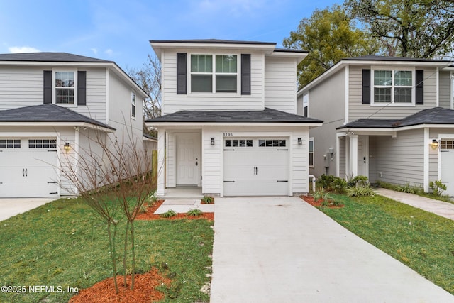 front of property with a garage and a front yard