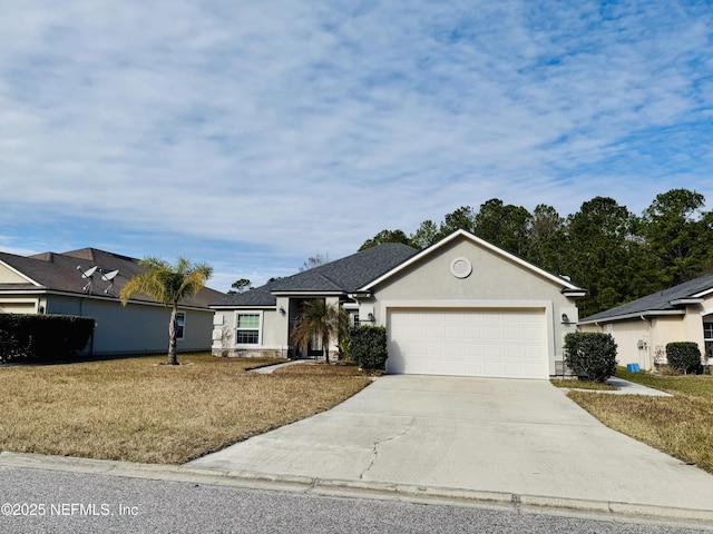 single story home featuring a garage and a front lawn