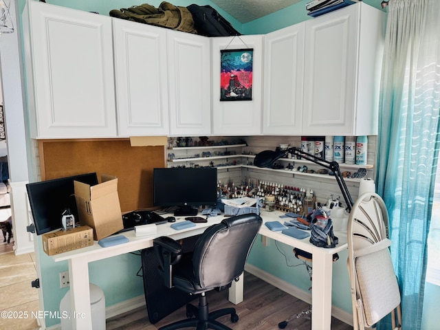 home office with light wood-type flooring