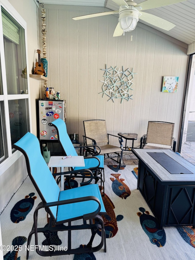 view of patio featuring ceiling fan