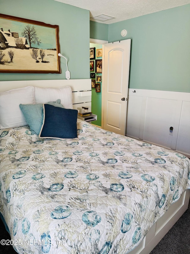 bedroom featuring a textured ceiling