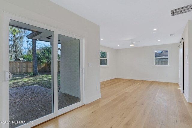 interior space with light hardwood / wood-style flooring