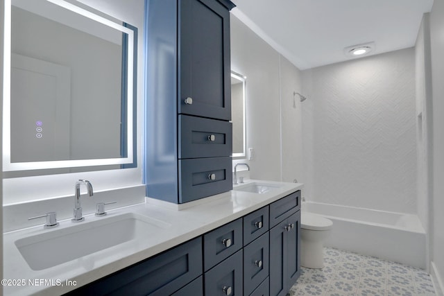 full bathroom featuring vanity, toilet, and washtub / shower combination