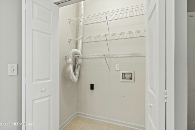 laundry area featuring hookup for a washing machine and hookup for an electric dryer