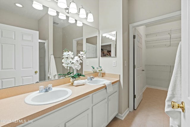 bathroom with vanity and tile patterned floors