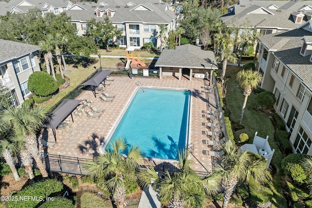 view of swimming pool featuring a patio area