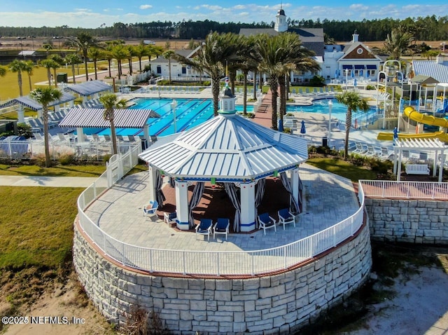 view of swimming pool featuring a gazebo and a patio area