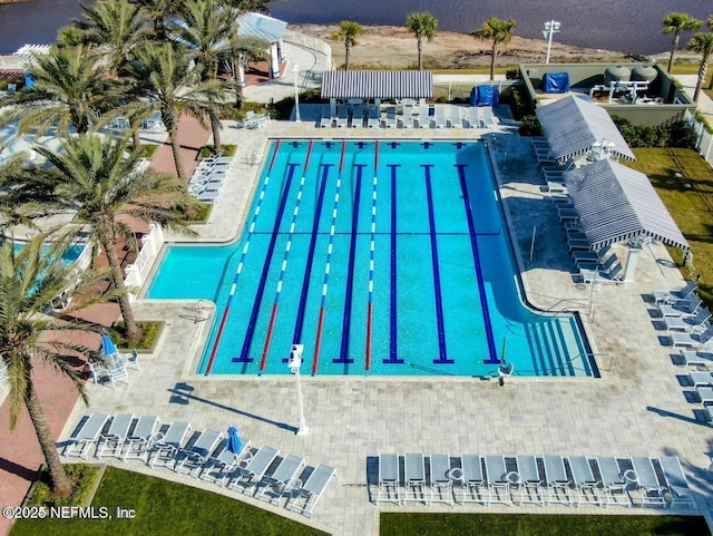 view of swimming pool featuring a patio