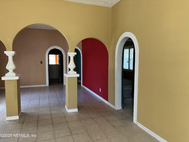 spare room with light tile patterned floors