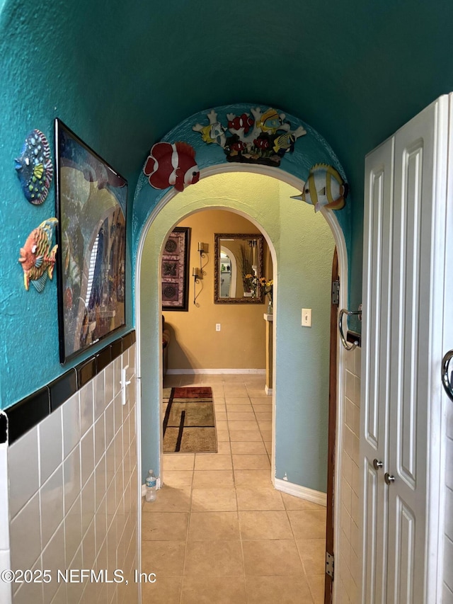 hall featuring tile patterned floors