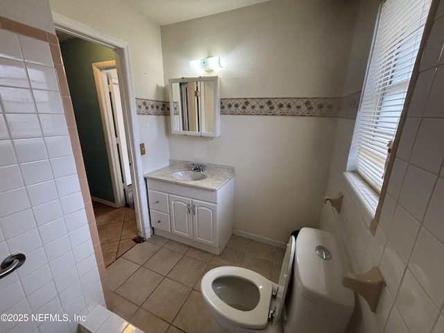 bathroom with vanity and tile patterned floors