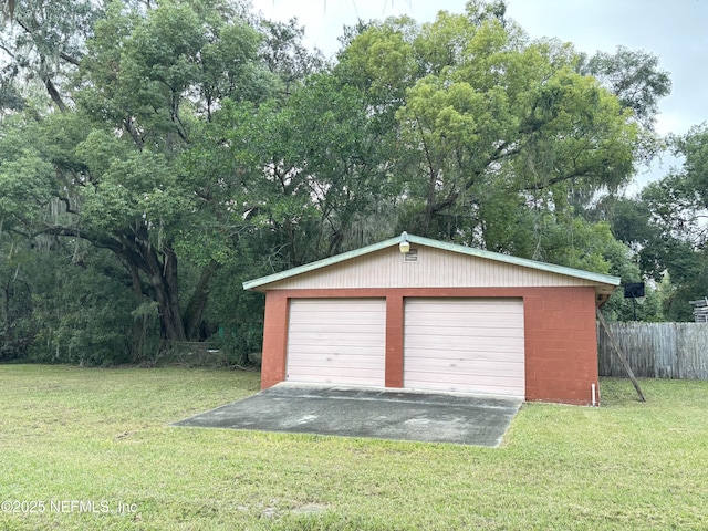 garage with a lawn