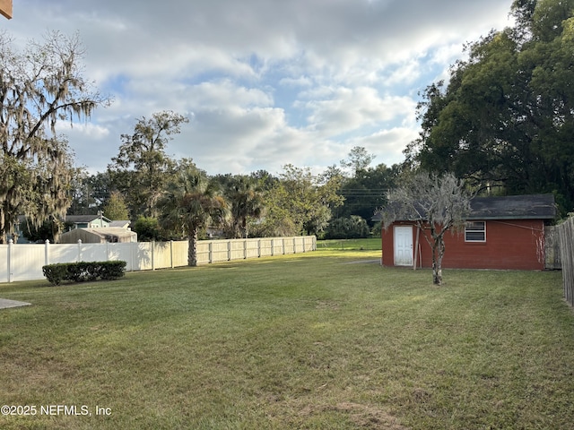 view of yard with a storage shed