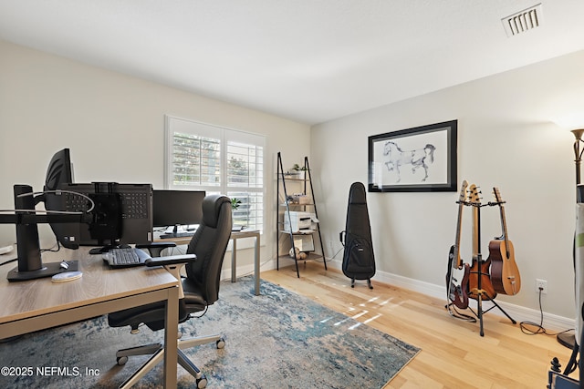 office featuring hardwood / wood-style flooring