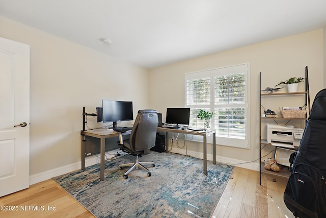 office with hardwood / wood-style flooring