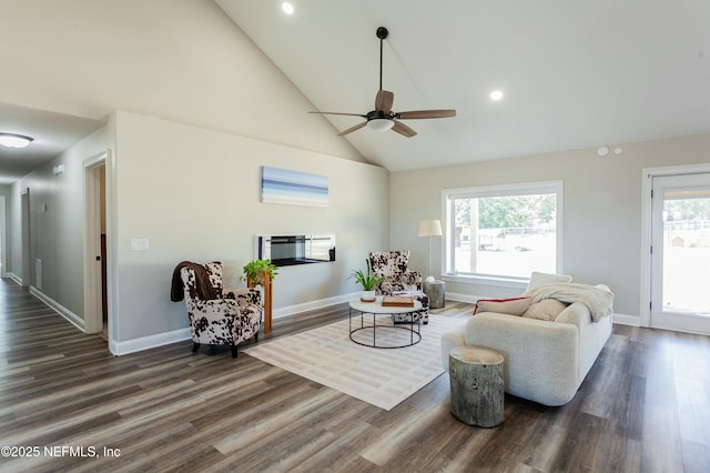 living room featuring high vaulted ceiling, a healthy amount of sunlight, and dark hardwood / wood-style floors