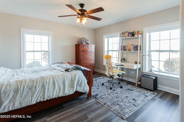 bedroom featuring dark hardwood / wood-style floors and ceiling fan