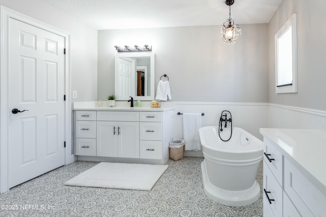 bathroom featuring vanity and a bathtub