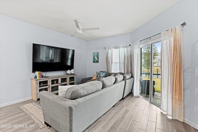 living room featuring ceiling fan