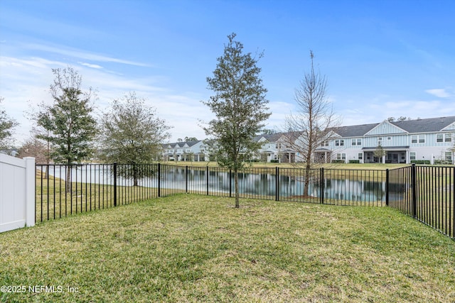 view of yard featuring a water view