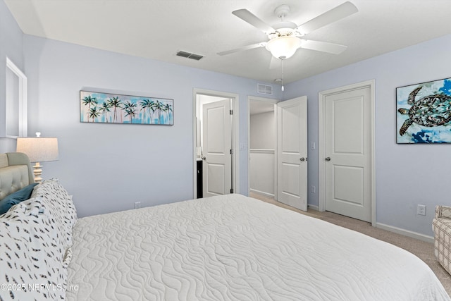 carpeted bedroom featuring ceiling fan