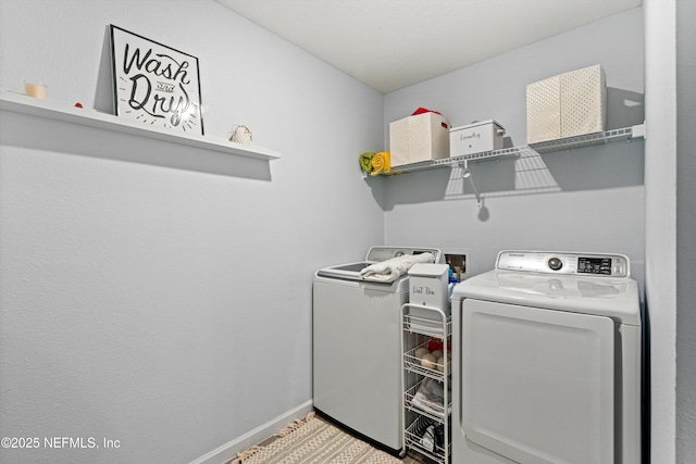 laundry room with washer and clothes dryer