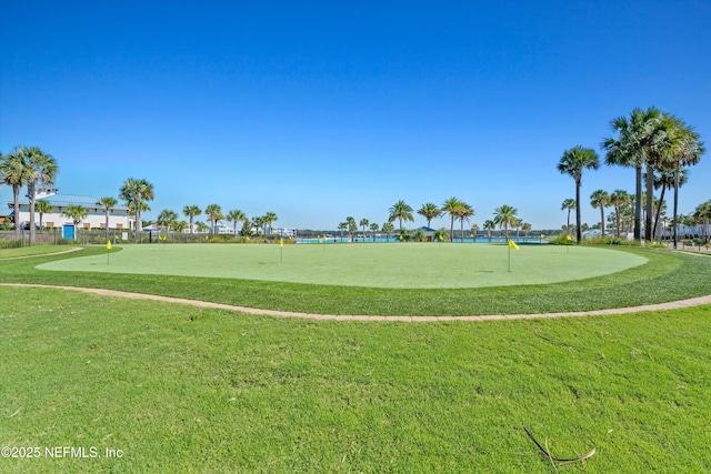 surrounding community featuring a lawn