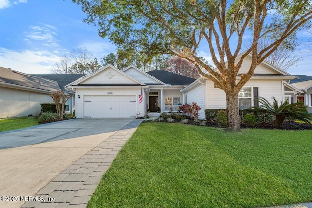 ranch-style house with a garage and a front lawn