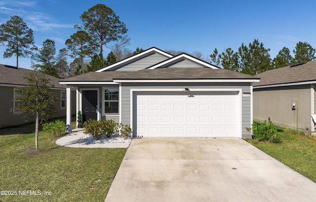 ranch-style home with a garage and a front lawn