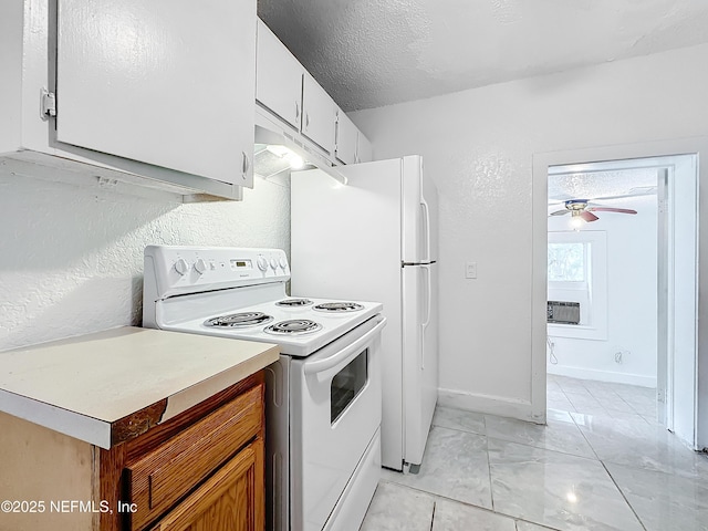 kitchen featuring white cabinets, ceiling fan, electric range, and a textured ceiling