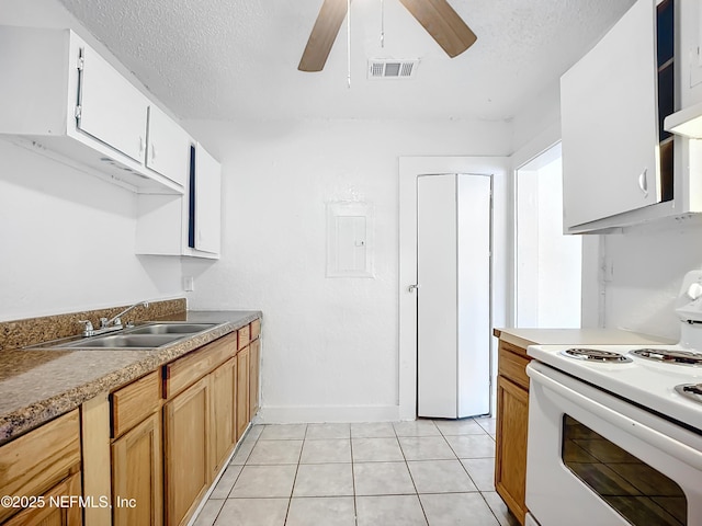 kitchen featuring sink, a textured ceiling, white cabinets, and white electric range oven