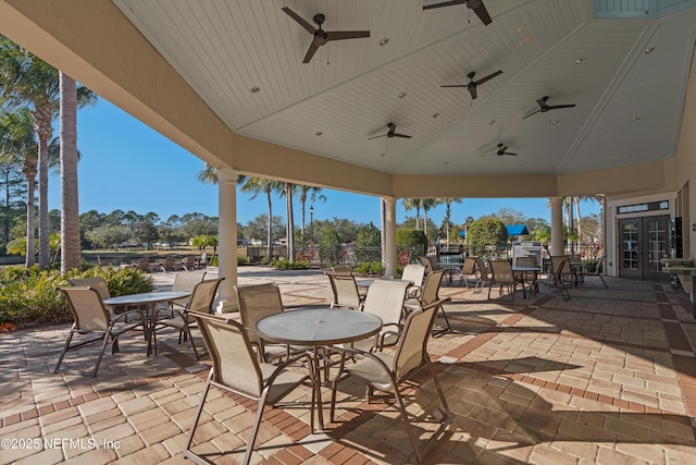 view of patio featuring a gazebo, french doors, and ceiling fan