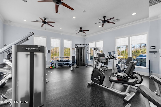 gym with crown molding and a textured ceiling