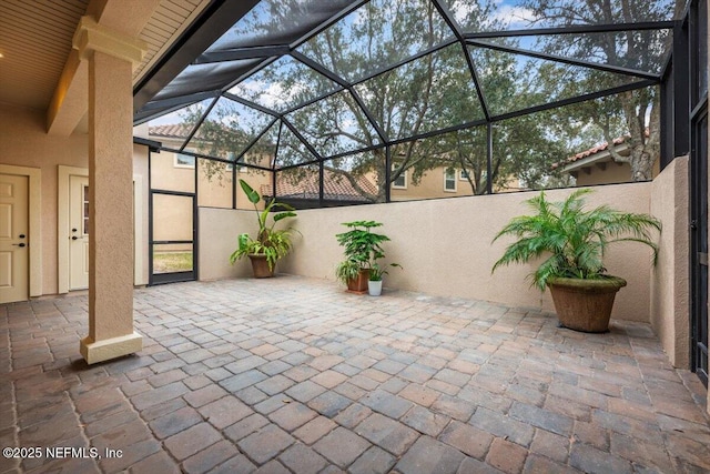 view of patio / terrace with a lanai