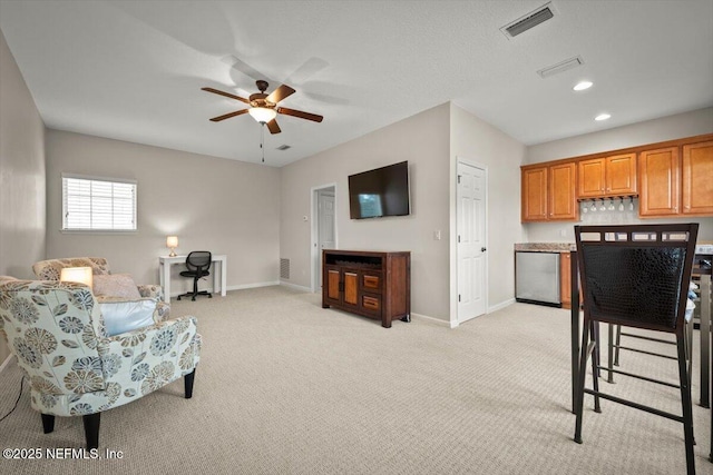 interior space featuring ceiling fan