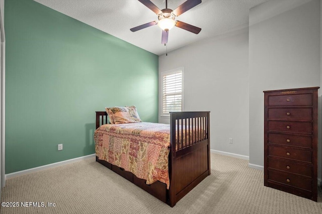 bedroom with light colored carpet and ceiling fan