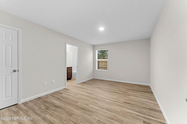 unfurnished room featuring light hardwood / wood-style flooring