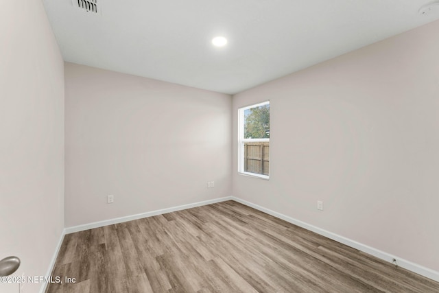 empty room featuring light hardwood / wood-style flooring