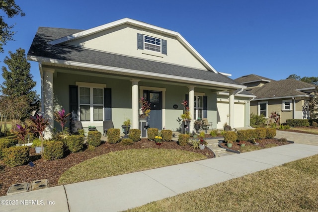 view of front of property with covered porch and a front lawn