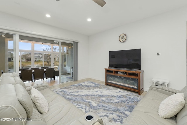 living room with ceiling fan