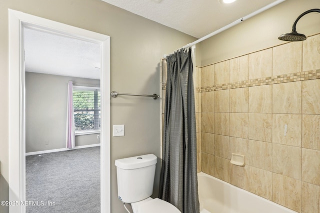 bathroom with shower / tub combo, a textured ceiling, and toilet