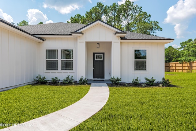 view of front of home with a front yard