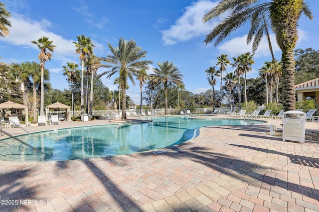 view of pool featuring a gazebo and a patio