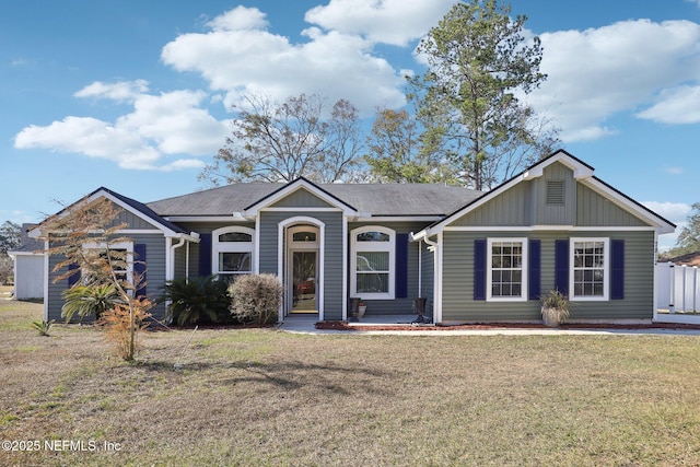 view of front of house with a front lawn