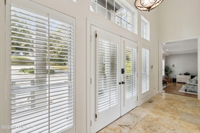 foyer entrance with ornamental molding