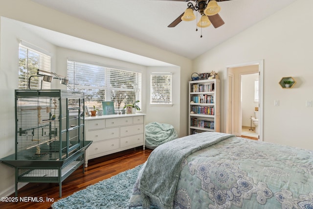 bedroom featuring lofted ceiling, dark wood-type flooring, and ceiling fan